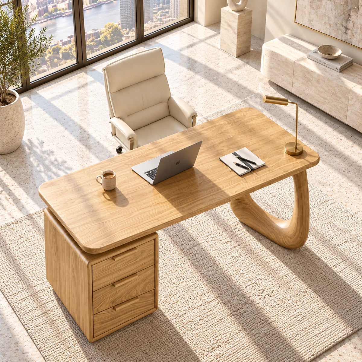Designed with generous legroom, the desk balances storage and sculptural character