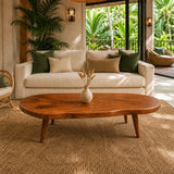 Rustic modern coffee table with an organic slab top and tapered solid wood legs