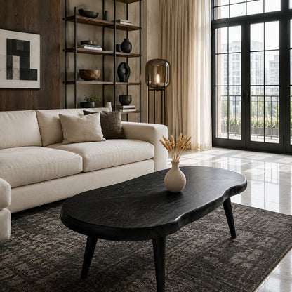 Statement coffee table with an asymmetrical top and handcrafted solid wood frame