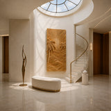 Large carved wall panel featuring palm trees and flowing lines in a refined entryway