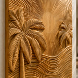 Vertical wall decor panel with carved palms and waves creates a striking focal point