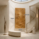 Oversized carved wall decor with palm and wave details elevates a minimalist setting
