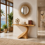 Sculptural console table with a twisted pedestal base in a bright coastal interior