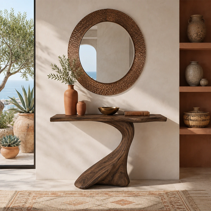 Artistic sofa table with a sweeping pedestal silhouette in a serene living space
