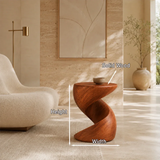 Minimalist side table with spiral form and compact profile for elegant living spaces