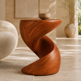 Accent end table featuring a spiral silhouette and visible grain in a refined living space