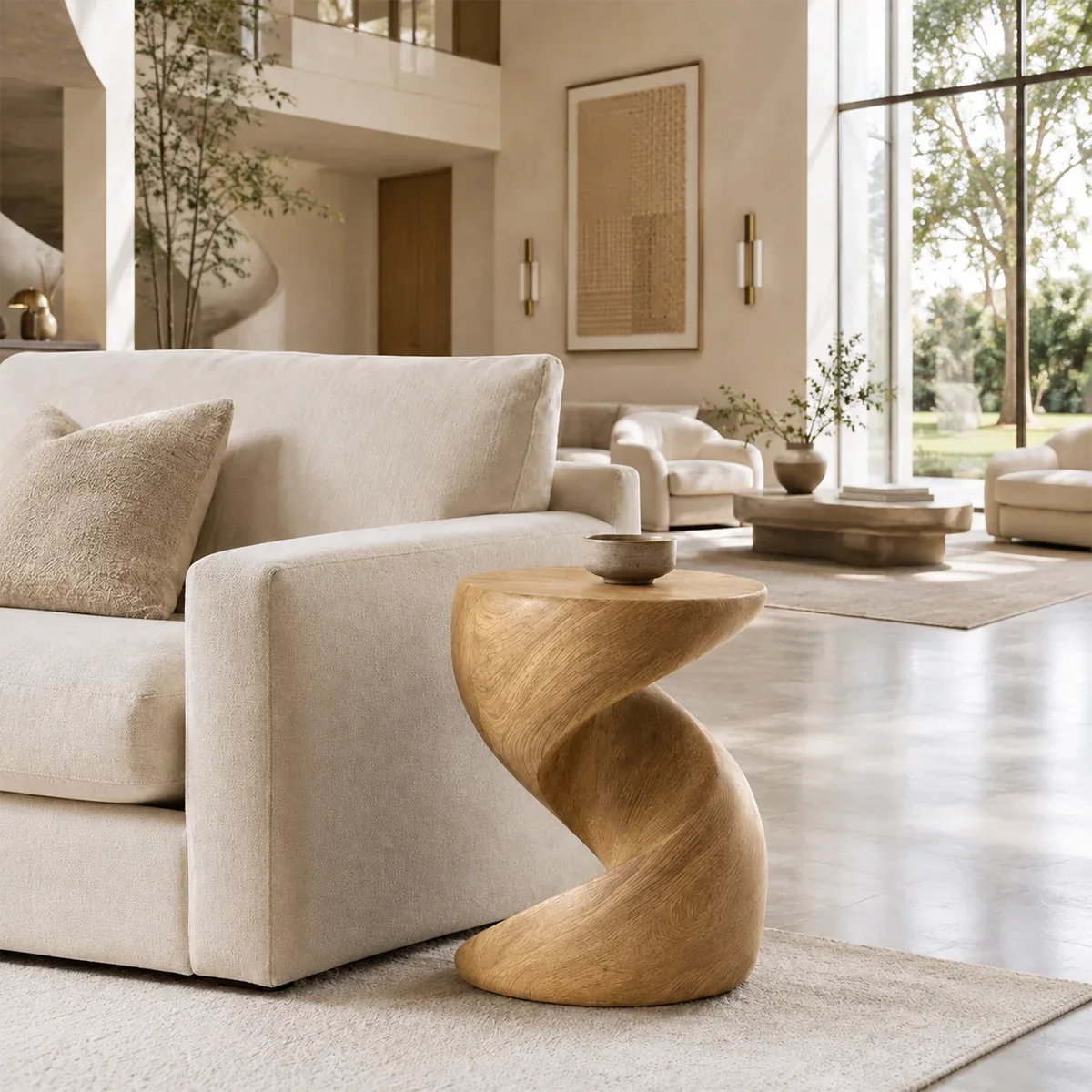 Luxury side table with a twisted sculptural base and rounded top in a bright interior
