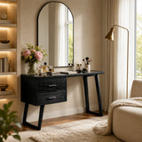 Vanity table with side drawers and slim supports for organized cosmetics and decor