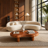Artisan coffee table with irregular slab contours and handcrafted supports for calm rooms