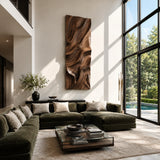 Suspended above lounge seating, this wall art adds movement through sculpted wave forms