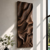 Flowing relief patterns shape this wall decor into a dramatic focal point for open rooms