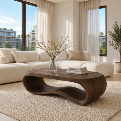 Sculptural coffee table with flowing solid wood curves for a calm modern living room