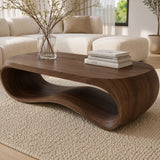 Organic coffee table with sculpted loop base and handcrafted solid wood construction