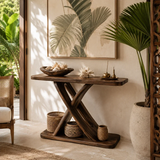 Artistic sofa table with a crossed base silhouette in a serene living room setting