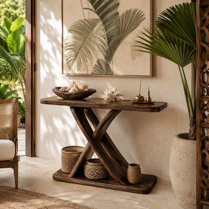 Artistic sofa table with a crossed base silhouette in a serene living room setting